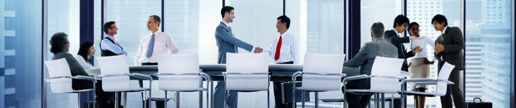 Team members getting ready for a team meeting